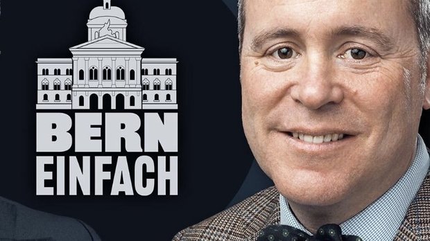 Bald heisst es für den Journalisten mit Fliege: «Neue Zürcher Zeitung» einfach. Dominik Feusi folgt auf Hansueli Schöchli im Wirtschaftsressort…    (Bild: © Nebelspalter)