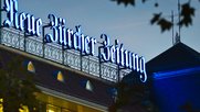 «Corona-Nothilfe zurückbezahlt»: NZZ will eine Dividende von 250 Franken pro Aktie ausschütten. (Bild © NZZ)