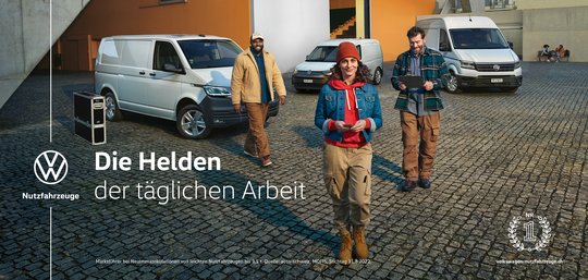 Die Transporthelden der täglichen Arbeit sind bei den Plakaten diskret aber unübersehbar im Hintergrund platziert...         (Sujet: KSP)